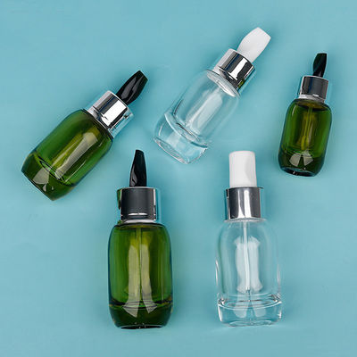 Skin Care Serum Cream Bottles 15ml 30ml 50ml Clear Green Glass Designs with Stirring Stick Customizable